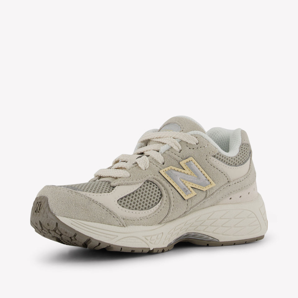 New Balance Kinder Unisex Sneakers in Creme